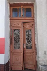 Doors with a trace of mezuzah on the doorpost