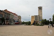 Square Rynok and its dominant - unfinished church, 2015