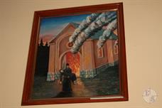 Painting in the Museum. "Priest Omelian Kovch rescues rabbi from Belz from burning synagogue"