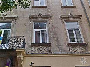Маскароны и путти на доме Самуэля Галля. Фото Google Maps