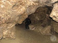 Попа пещерного человека