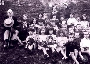 Tarbut school pupils with their teachers in a cemetery, 1931. All of them perished except for the submitter who emigrated to Canada in 1934