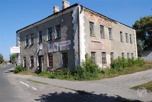 Former synagogue in Liubeshiv, 2000s. In Soviet times, shops were located in the building