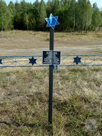 The grave of the victims of the Holocaust in Mala Hlusha, which were reburied after the war, 2015